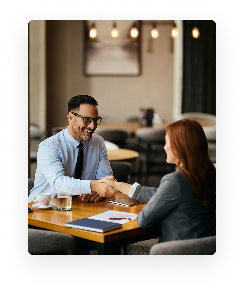 Business partnership handshake
