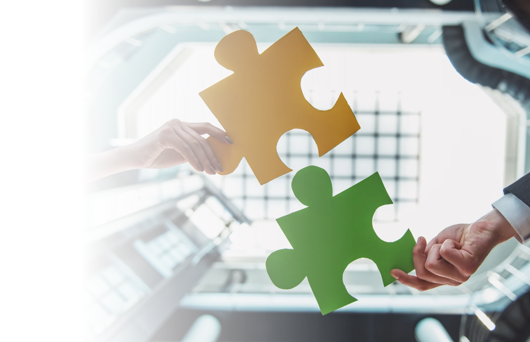 Partnership puzzle pieces connecting for better implementations